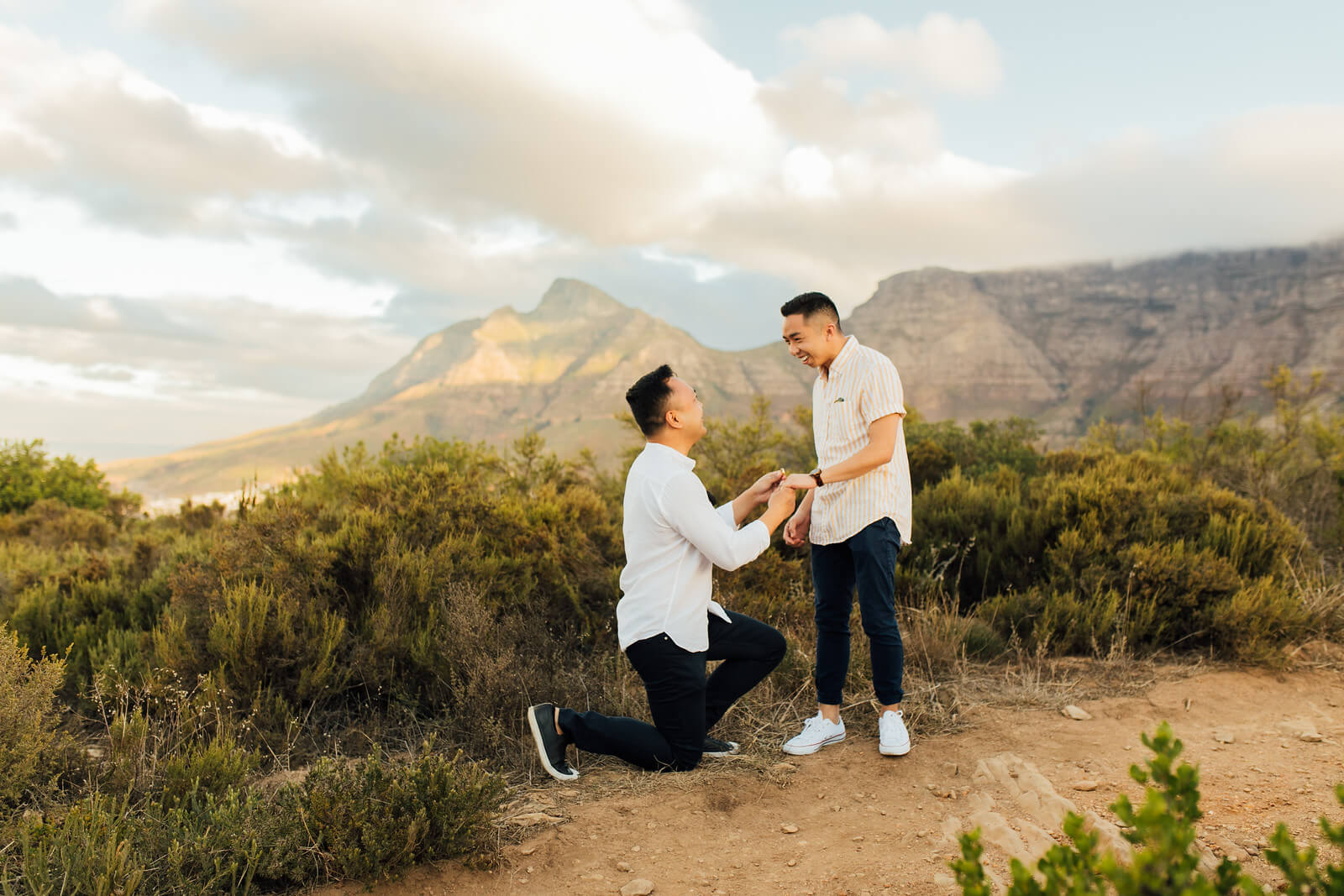 A proposal moment on top of a mountain in Cape Town